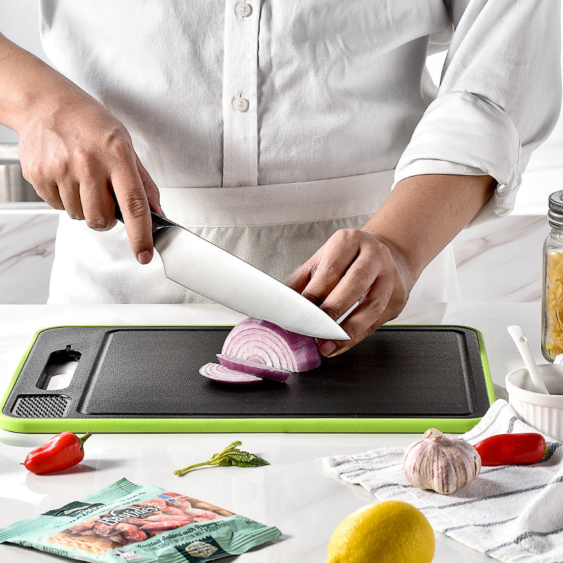 Defrosting Cutting Board with Knife Sharpener in use